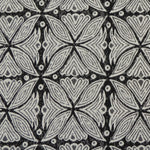 Detail of fabric in a botanical geometric print in shades of gray and charcoal.