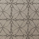 Detail of fabric in a botanical geometric print in shades of gray.