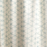 Draped fabric yardage in a painterly lattice print in light blue on a cream field.