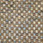 Handwoven rug detail in a textural design in blue, tan, cream