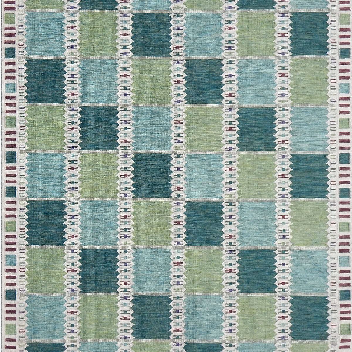 Handwoven rug in a Swedish checkerboard design shades of green and teal with white and brown accents. 