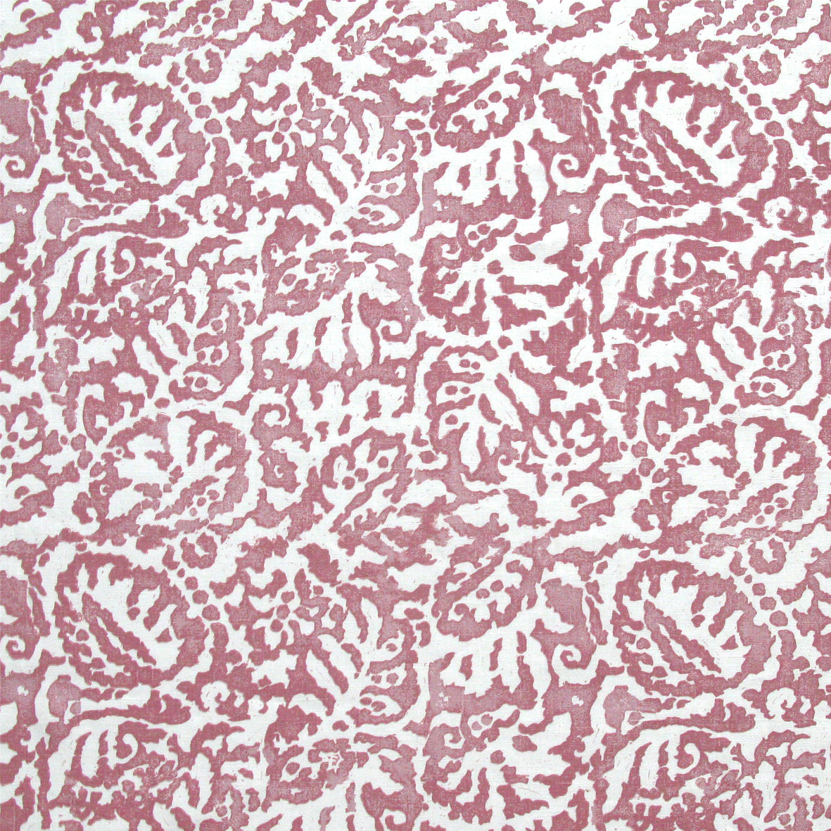 Fabric in a botanical paisley print in white on a dusty rose field.