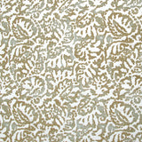 Fabric in a botanical paisley print in white on a mottled gray and tan field.