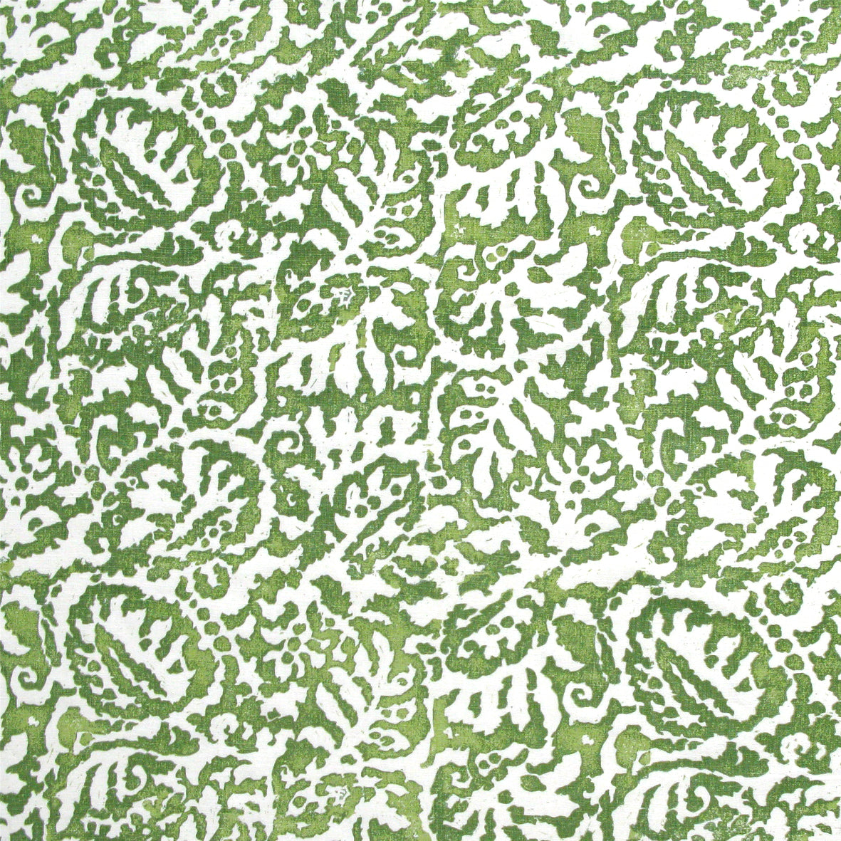 Fabric in a botanical paisley print in white on a green field.