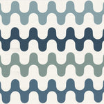 Detail of wallpaper in a playful curving stripe print in shades of green, blue and gray on a white field.