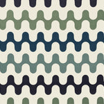 Detail of fabric in a playful curving stripe print in shades of green, blue and brown on a white field.