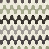 Detail of fabric in a playful curving stripe print in shades of green and gray on a white field.