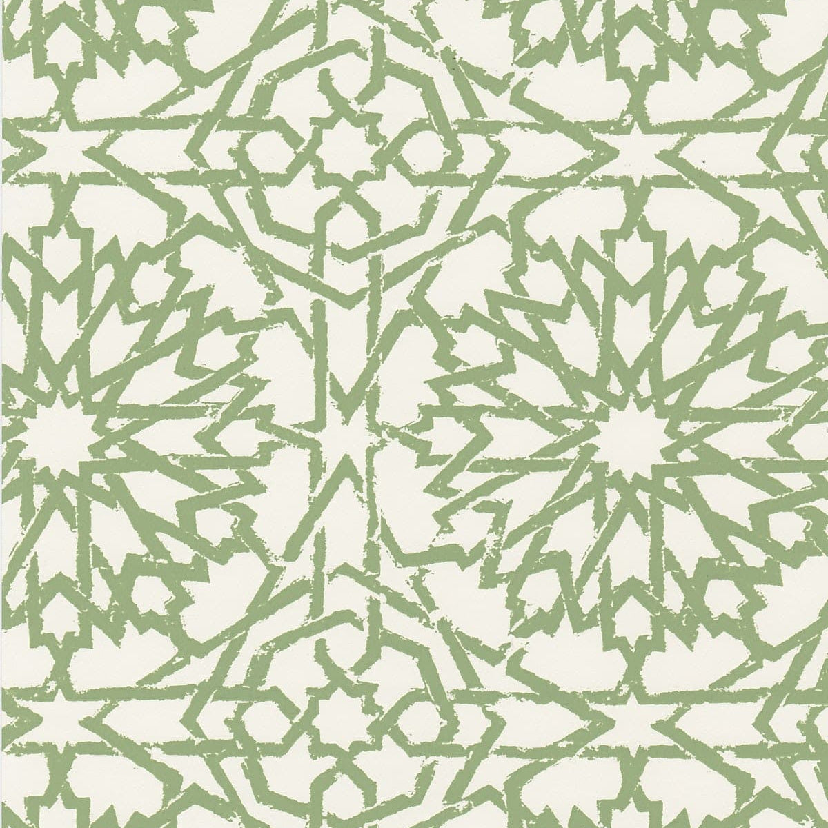 Detail of wallpaper in a small-scale lattice print in green on a cream field.