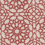 Detail of fabric in a small-scale lattice print in red on a cream field.