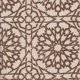 Detail of fabric in a small-scale lattice print in brown on a cream field.