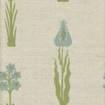 Detail of fabric in a playful floral print in blue and green on a cream field.