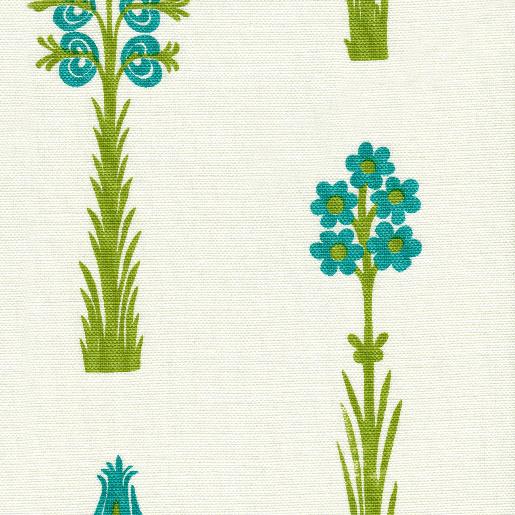 Detail of fabric in a playful floral print in green and turquoise on a cream field.