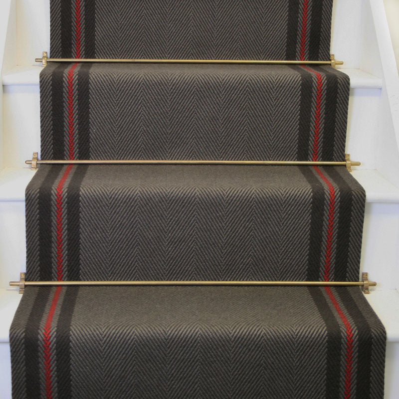 Striped flatweave runner in grey and red on white staircase