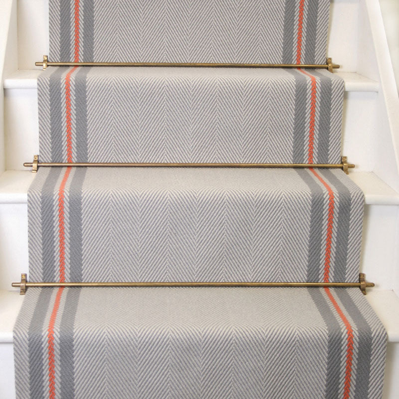 Striped flatweave runner in grey taupe and red on white staircase