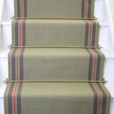 Striped flatweave runner in green grey and red on white staircase