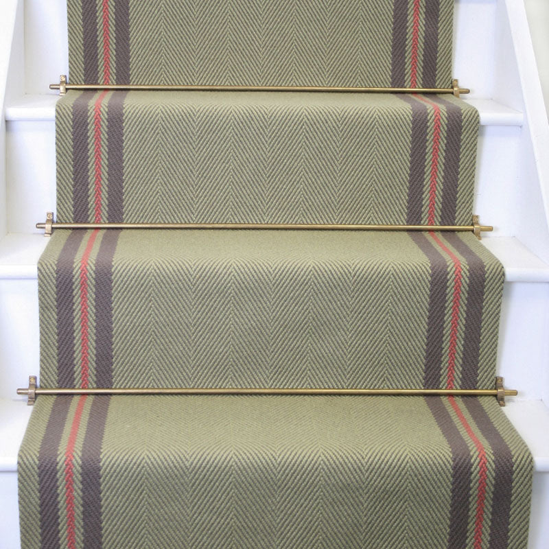 Striped flatweave runner in green grey and red on white staircase