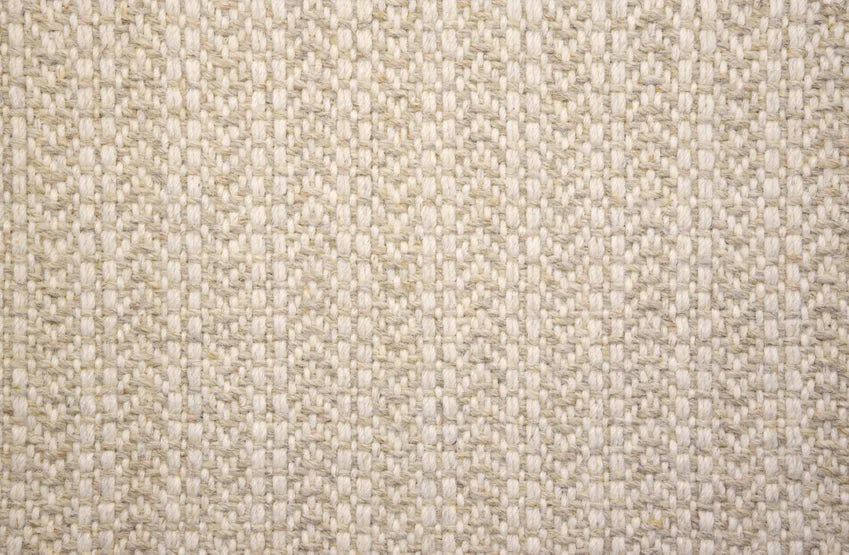 Broadloom carpet swatch in a herringbone pattern in a neutral design