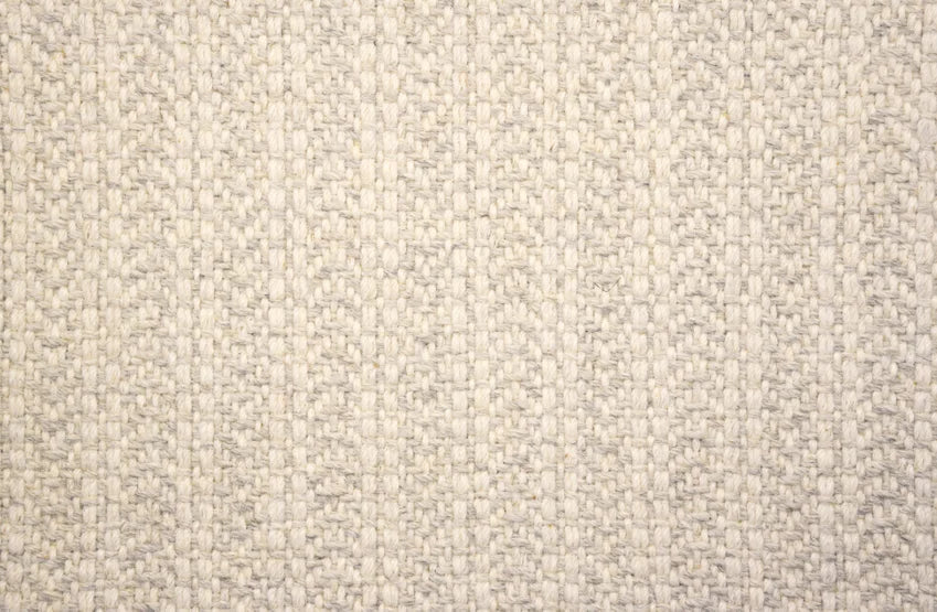 Broadloom carpet swatch in a herringbone pattern in a white design