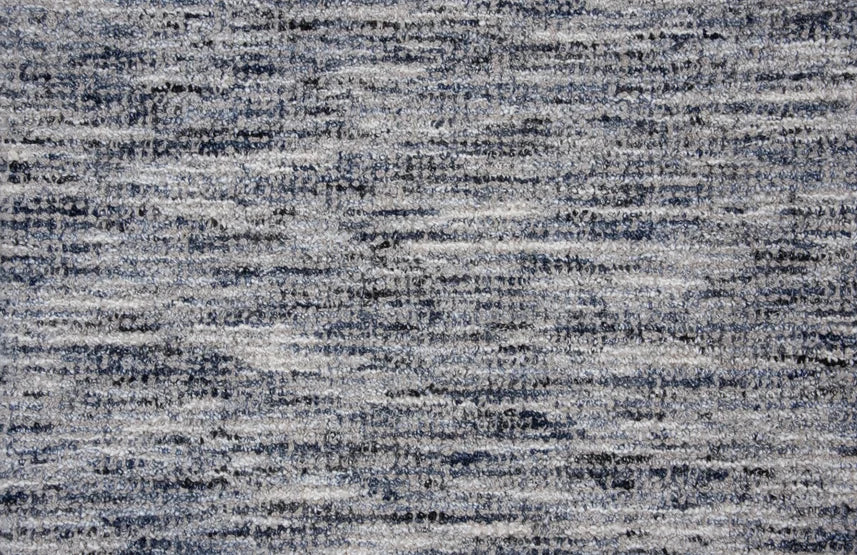 Broadloom carpet swatch in a textural pattern in a dark grey slate blue design