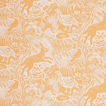 Detail of wallpaper in a playful rabbit and bird print in white on a yellow field.