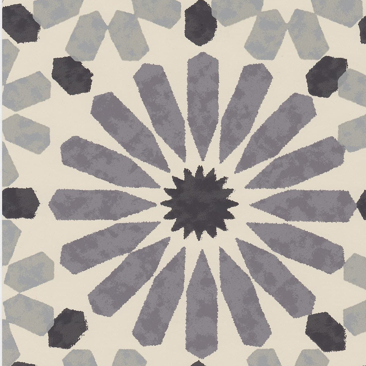 Detail of wallpaper in a geometric lattice print in shades of black, blue and gray on a cream field.