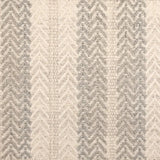 Broadloom carpet swatch in a herringbone pattern in a cream light grey design