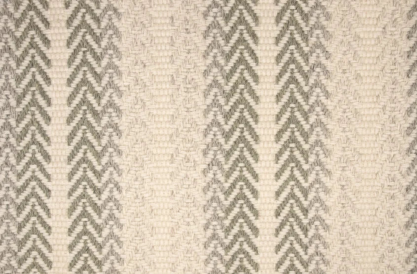 Broadloom carpet swatch in a herringbone pattern in a cream sage design