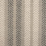 Broadloom carpet swatch in a herringbone pattern in a cream dark grey design