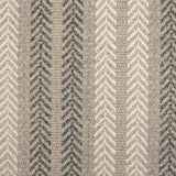 Broadloom carpet swatch in a herringbone pattern in a cream dark grey design