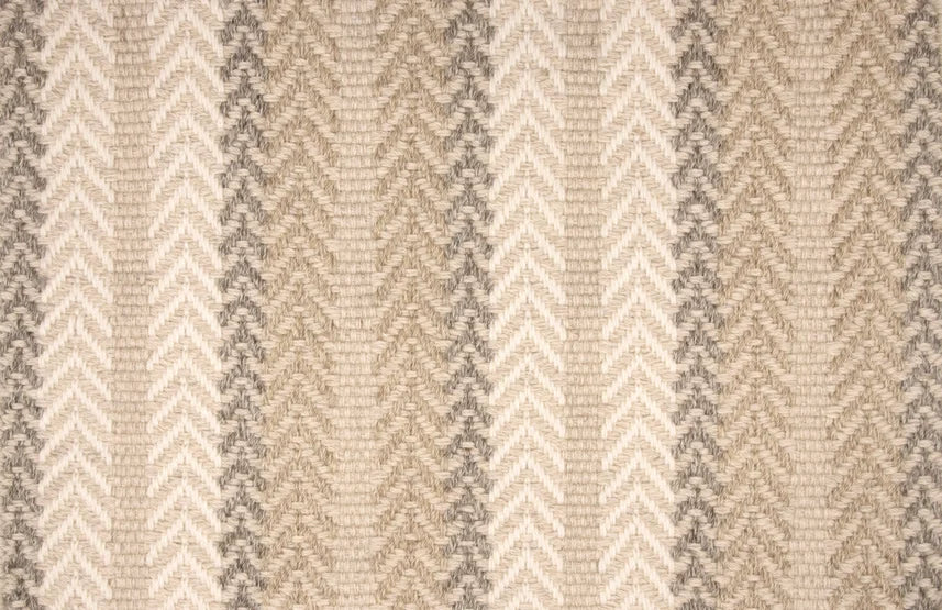 Broadloom carpet swatch in a herringbone pattern in a cream neutral tan design