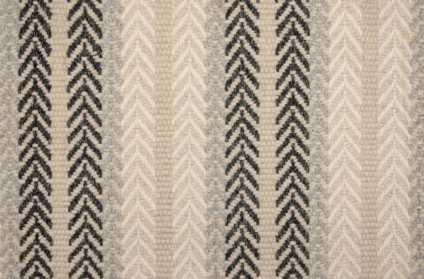 Broadloom carpet swatch in a herringbone pattern in a cream black design