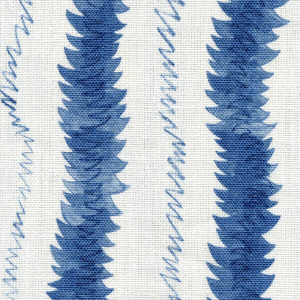 Fabric in a painterly meandering stripe print in blue and navy on a cream field.