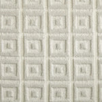 Broadloom carpet swatch in a geometric pattern in a white design