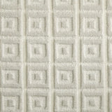 Broadloom carpet swatch in a geometric pattern in a white design