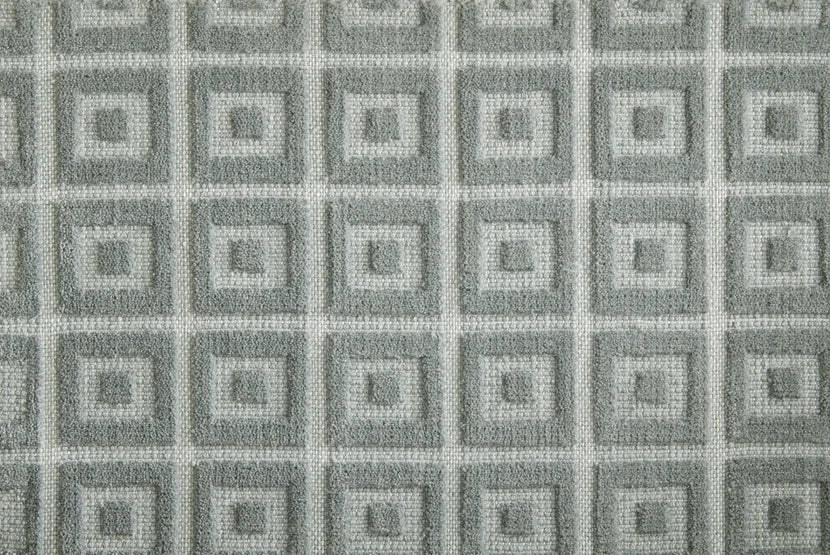 Broadloom carpet swatch in a geometric pattern in a sage design