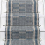 Striped flatweave runner in blue on white staircase 