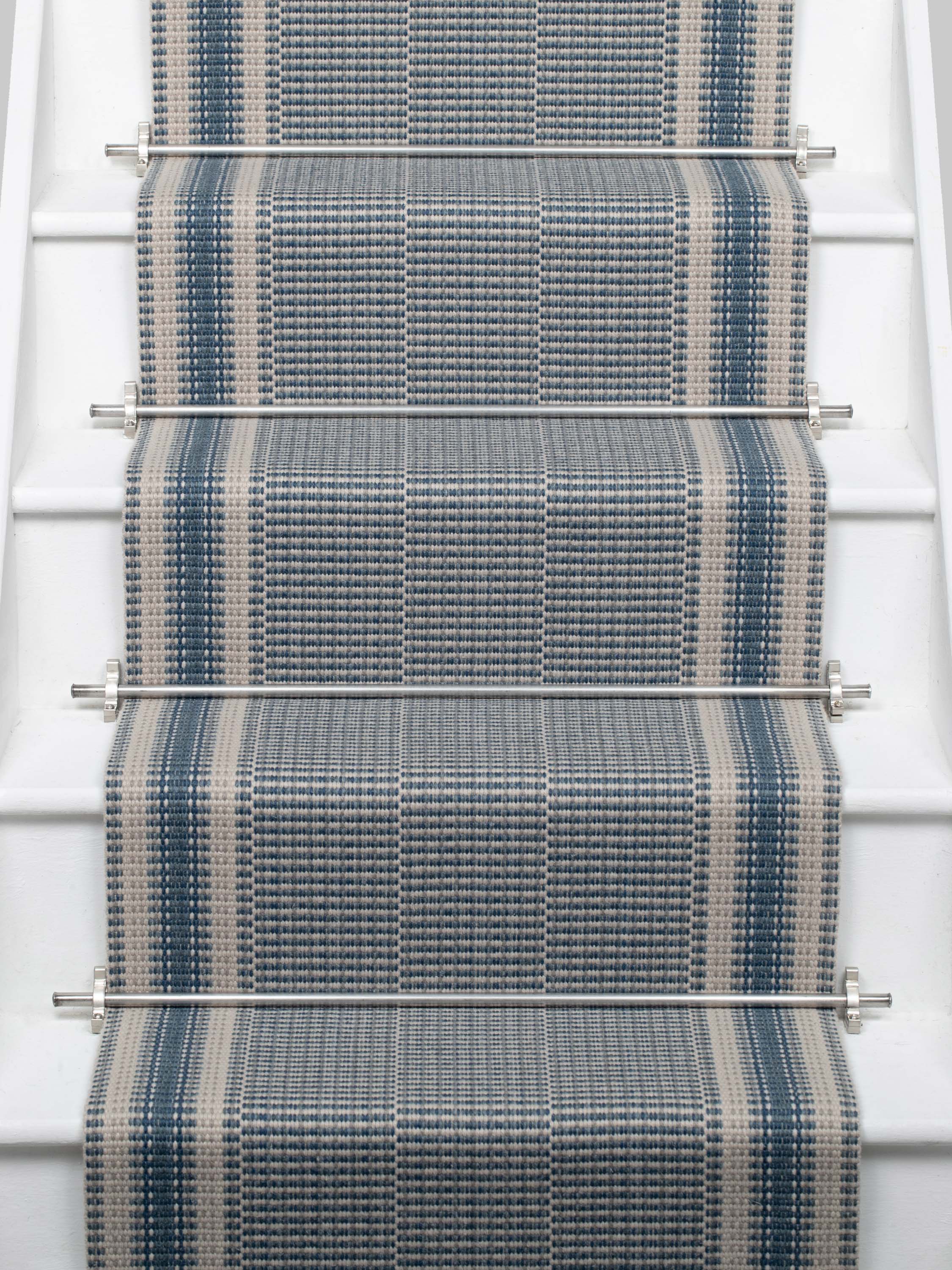 Striped flatweave runner in blue on white staircase 