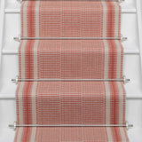 Striped flatweave runner in red on white staircase