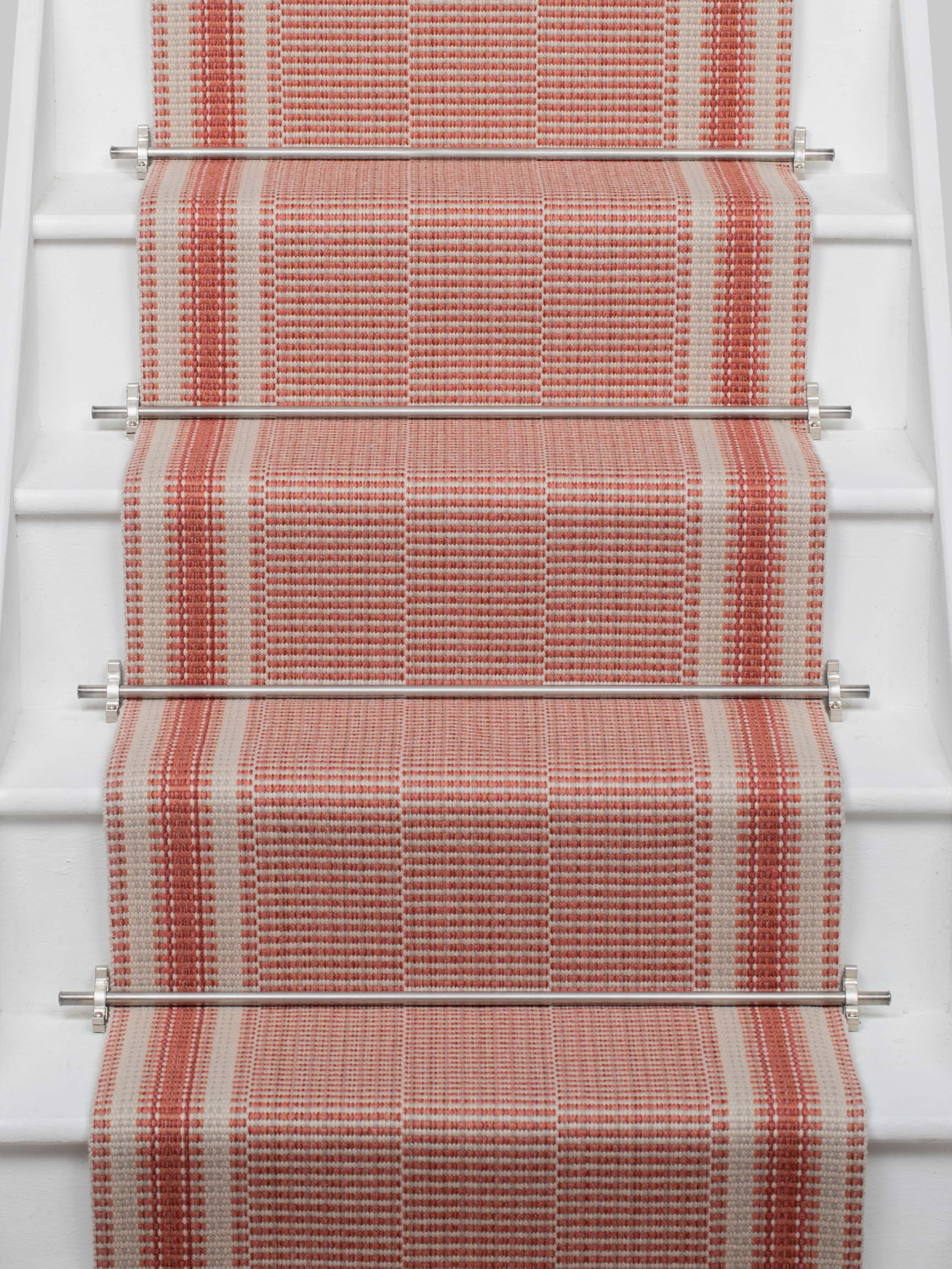 Striped flatweave runner in red on white staircase