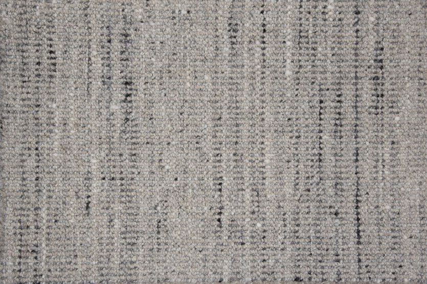 Broadloom carpet swatch in a textural pattern in a dark grey design