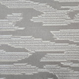 Broadloom carpet detail in an abstract cloud design in ivory and toner grey.