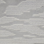 Broadloom carpet detail in an abstract cloud design in ivory and soft grey.