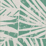 Detail of fabric in a botanical grid print in turquoise on a white field.