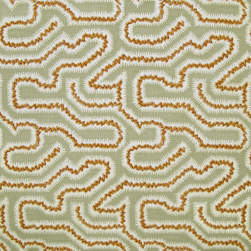 Detail of fabric in a dense meandering print in white, orange and red on a light green field.