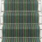 Striped flatweave runner in green blue black on white staircase