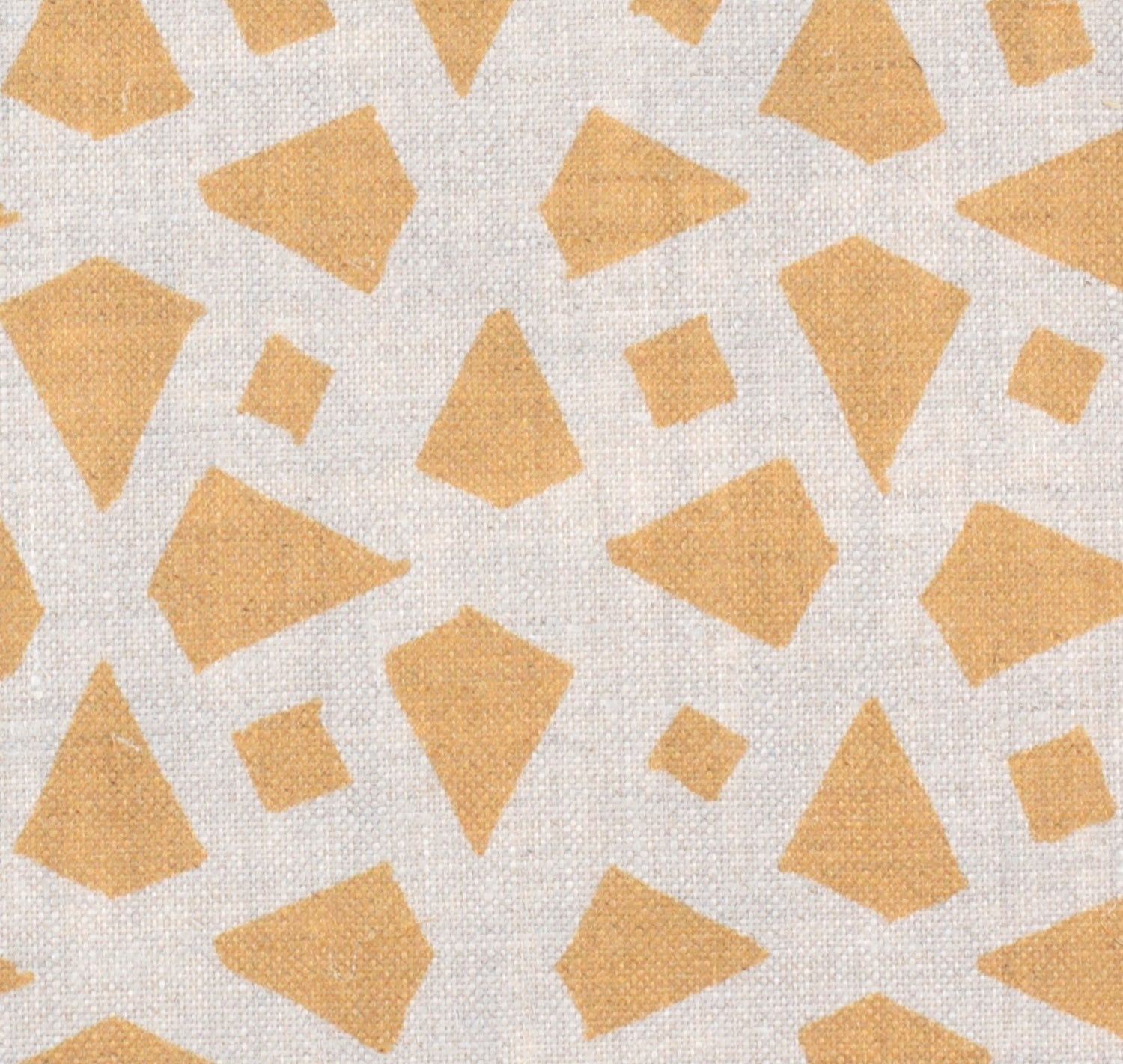 Detail of fabric in a geometric lattice print in yellow on a cream field.