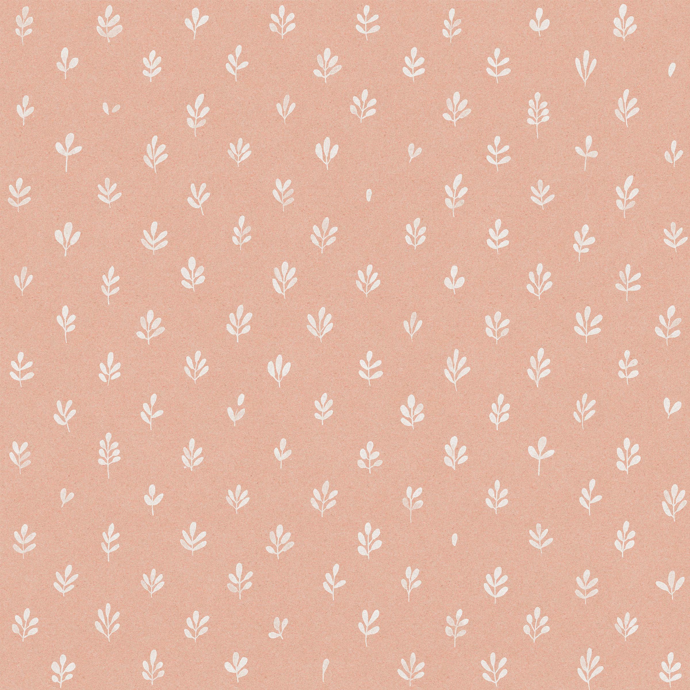 Detail of fabric in a repeating leaf print in cream on a light pink field.