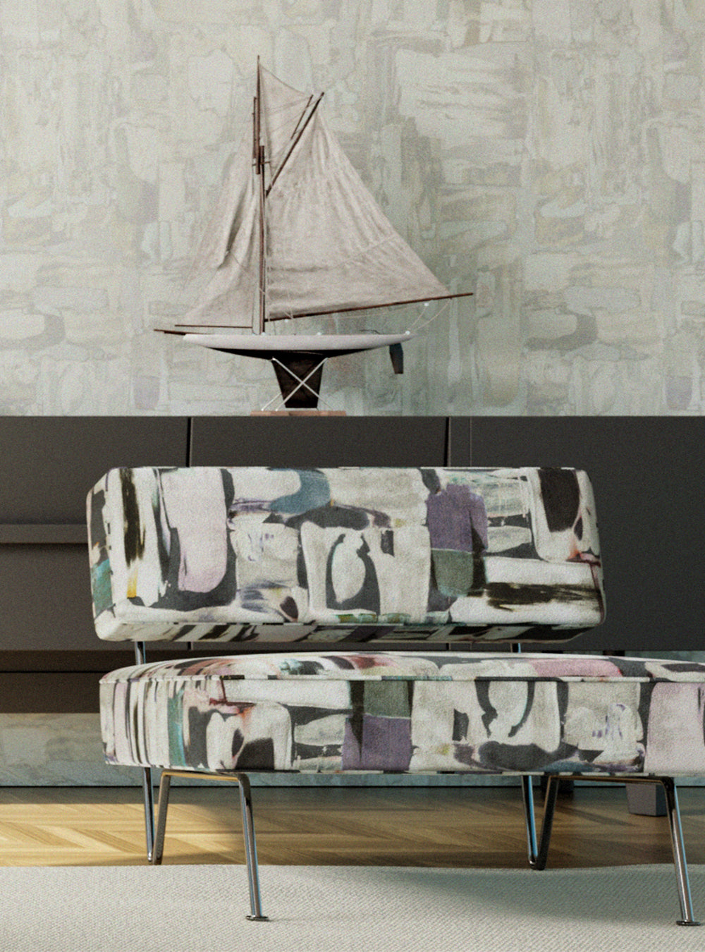 A minimalist armchair upholstered in an abstract layered paint blotch print in gray, white, olive and purple.