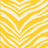 Detail of fabric in a zebra print in yellow on a cream field.