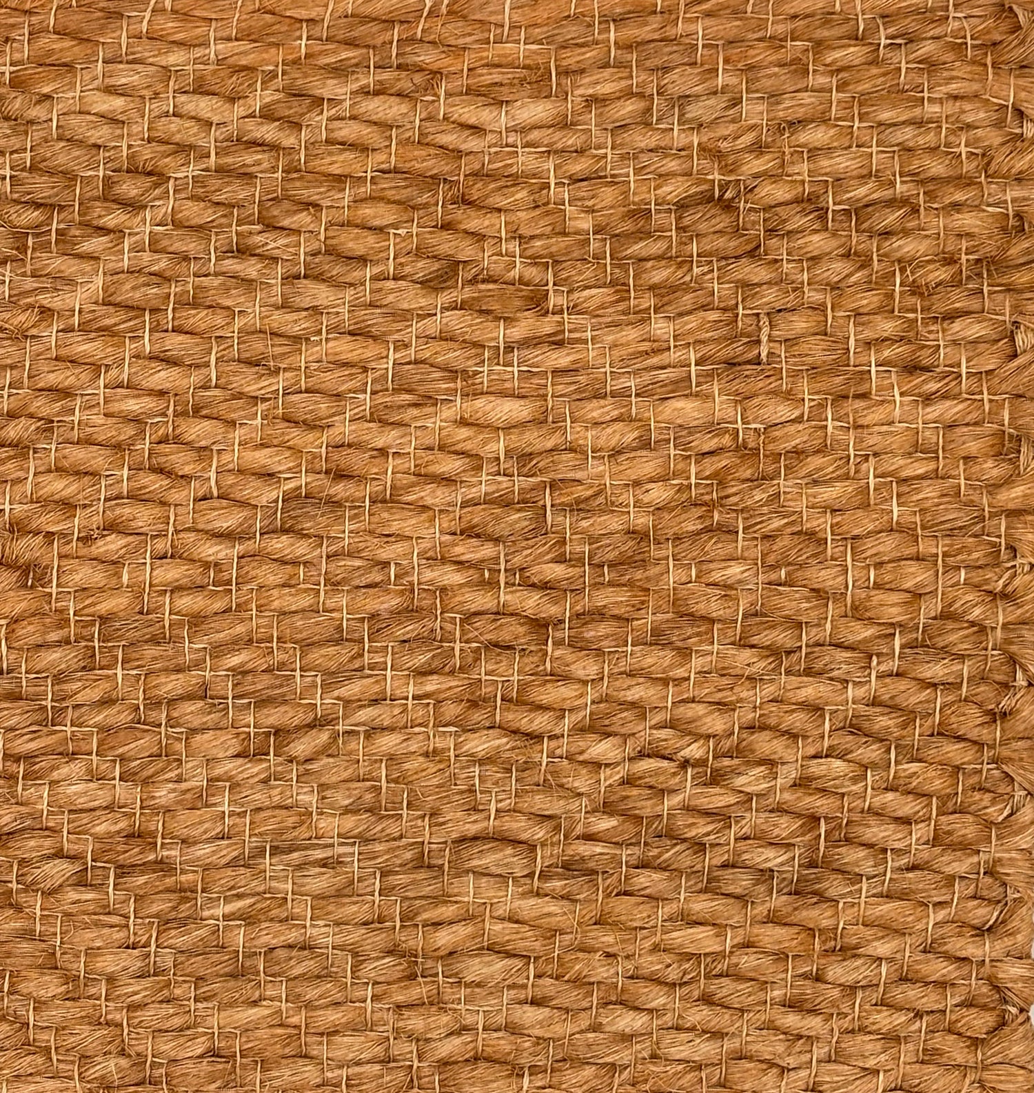 Handwoven rug sample in brown abaca.